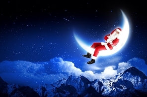 photo of santa claus sitting on the moon