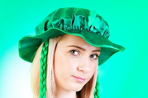 Saint Patrick day concept with young girl