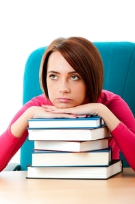 Young female student with many study books