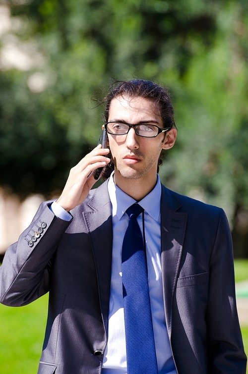 Young businessman at the street scene