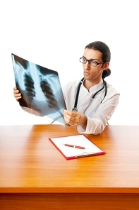 Male doctor looking at x-ray image