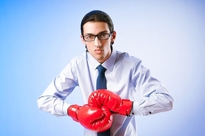 Businessman with boxing gloves