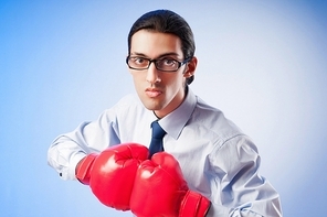 Businessman with boxing gloves