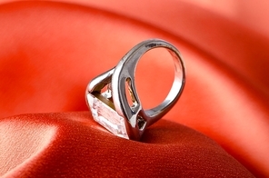 Fashion concept with ring on background