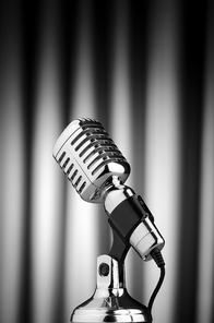 Vintage microphone against the background