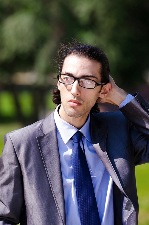 Young businessman at the street scene