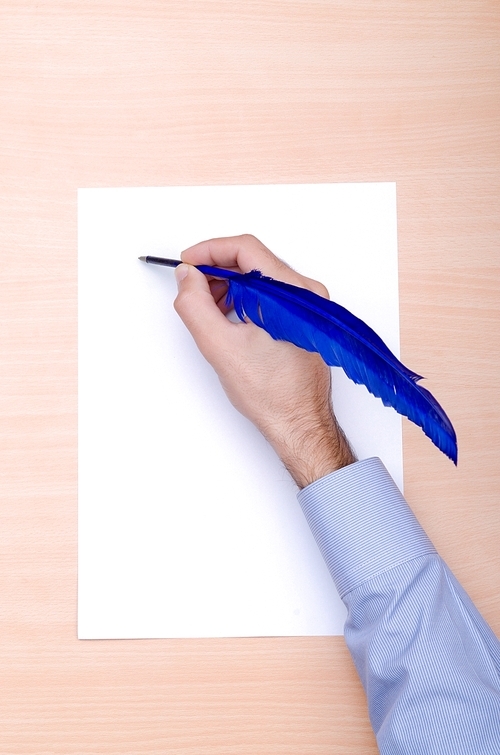 Man with quill writing