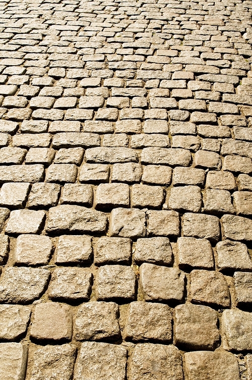 Old road paved with the cobble stones