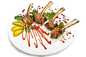 Lamb ribs served in the plate