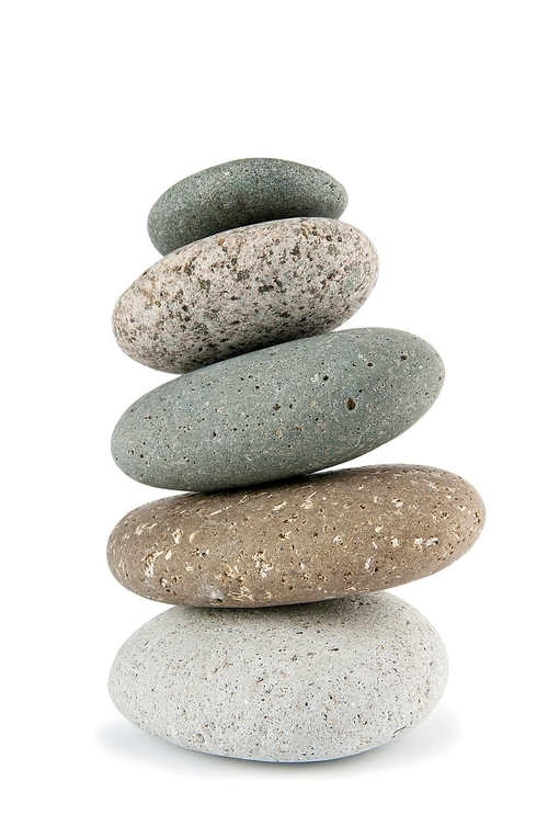 Stack of pebbles isolated on the white