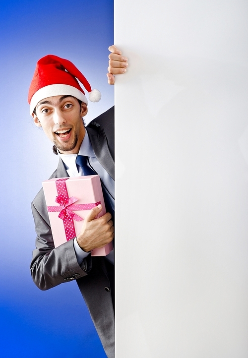 Businessman in santa hat with blank message