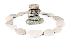 Stack of pebbles isolated on the white