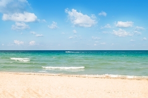 Sand beach on the bright summer day