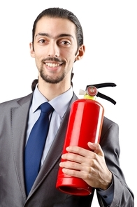 Man with fire extinguisher in firefighting concept