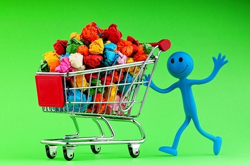 Recylcing concept with color paper and shopping cart