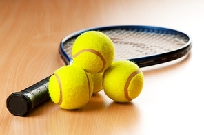 Tennis concept with balls and racket