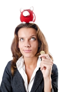 Woman with piggybank on white