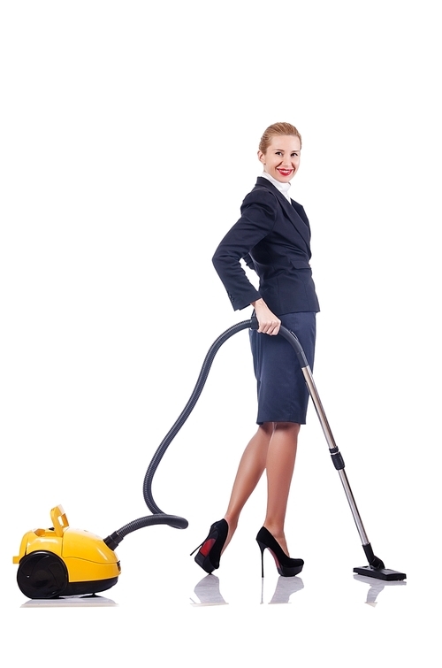 Woman cleaning with vacuum cleaner