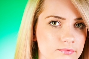 Blond girl against colourful background