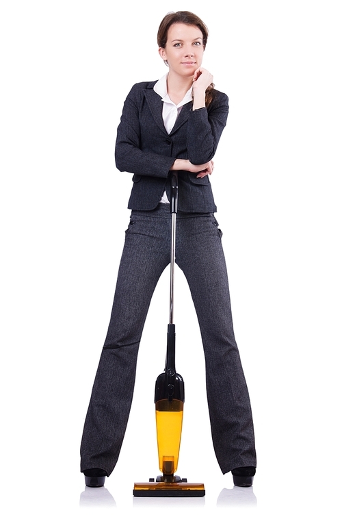 Young woman doing vacuum cleaning