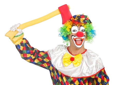 Clown with axe isolated on white