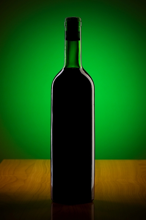 Wine against colour gradient background