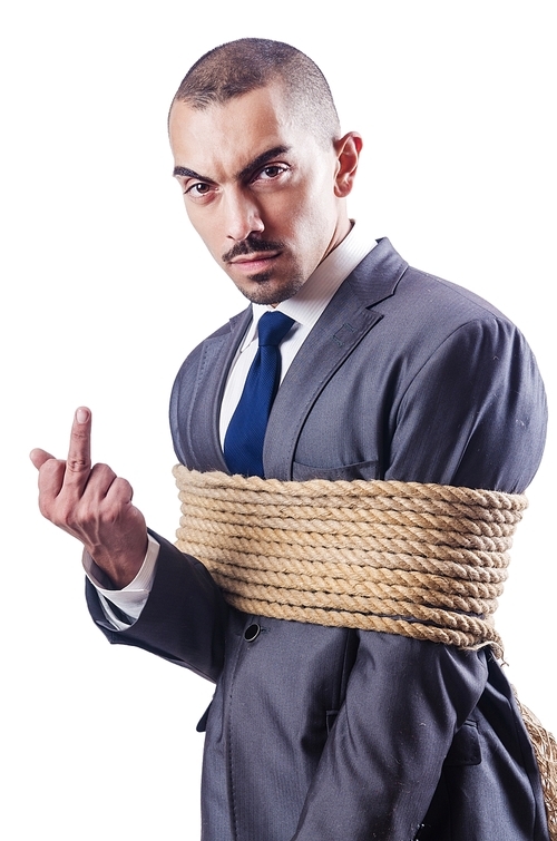 Businessman tied up with rope