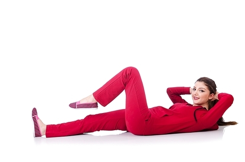 Young woman doing exercises on white