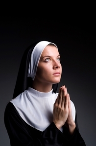 Young nun in religious concept