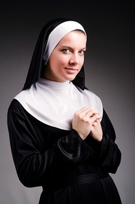 Young nun in religious concept