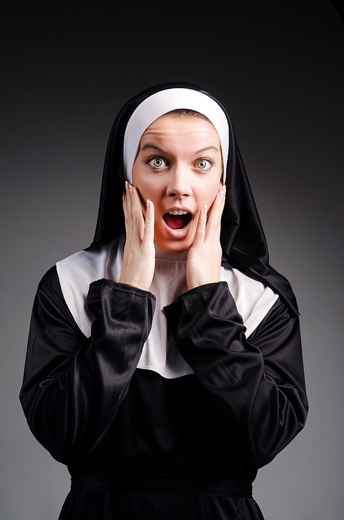 Young nun in religious concept