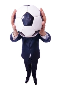 Man with football isolated on white