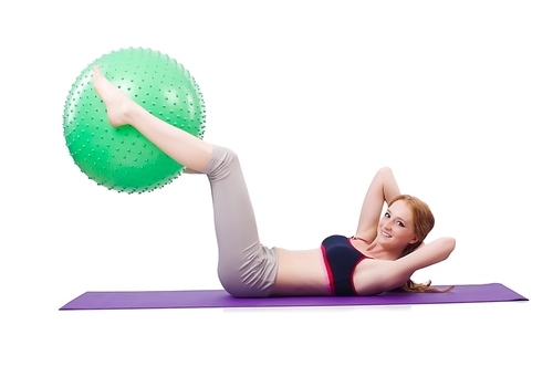 woman exercising with  ball on white
