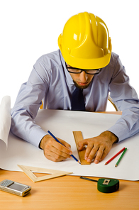 Engineer working with drawings on white