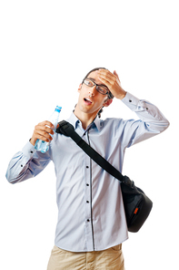 Student drinking water on white