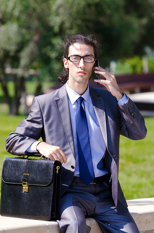 Young businessman at the street scene