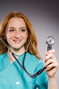 Woman doctor with the stethoscope