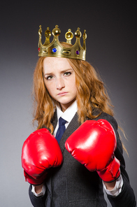 Woman boxer with crown and red gloves