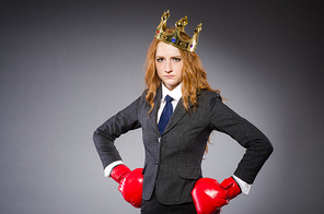 Woman boxer with crown and red gloves