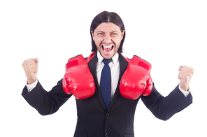 Businessman with boxing gloves on white