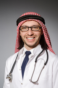 Funny arab doctor with stethoscope