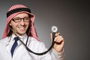 Funny arab doctor with stethoscope