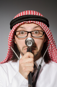 Funny arab doctor with stethoscope