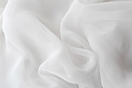 White transparent graceful fabric close up