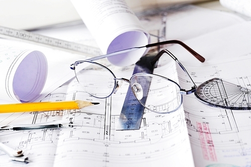 Ruler|eraser|glasses and a pencil on the floor plan - Bussines a still-life