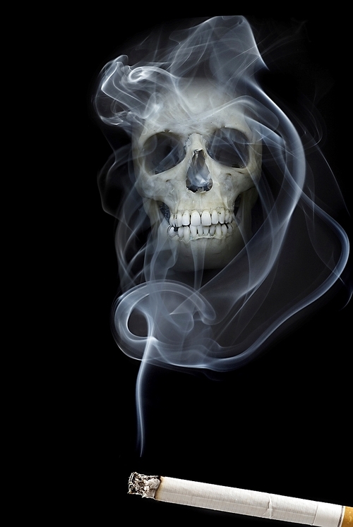human scull appears in cigarette smoke