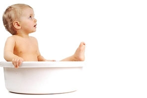 nude little girl in  white  bath