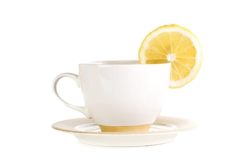 full cup of tea with lemon and sugar