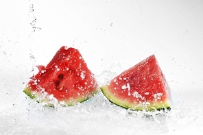 fresh watermelon and water splash isolated