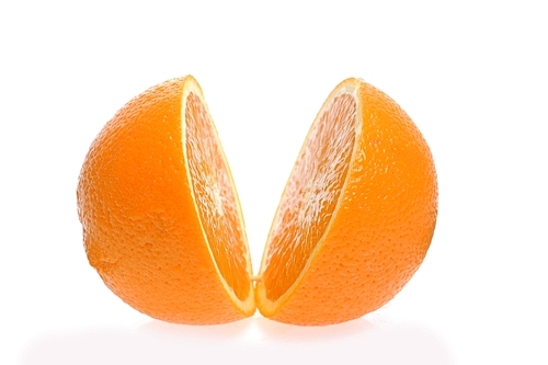 sliced orange isolated on white